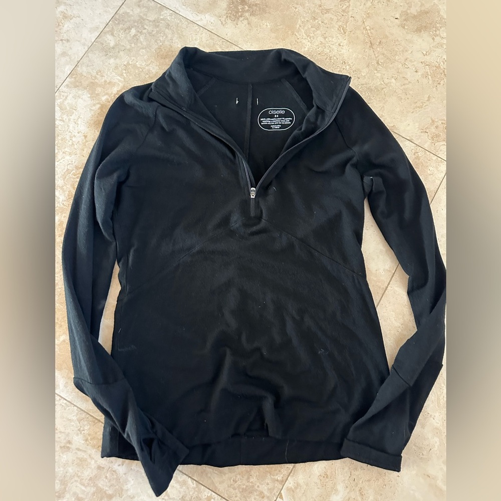 never worn but 2 tiny holes near zipper
has zippered back pocket